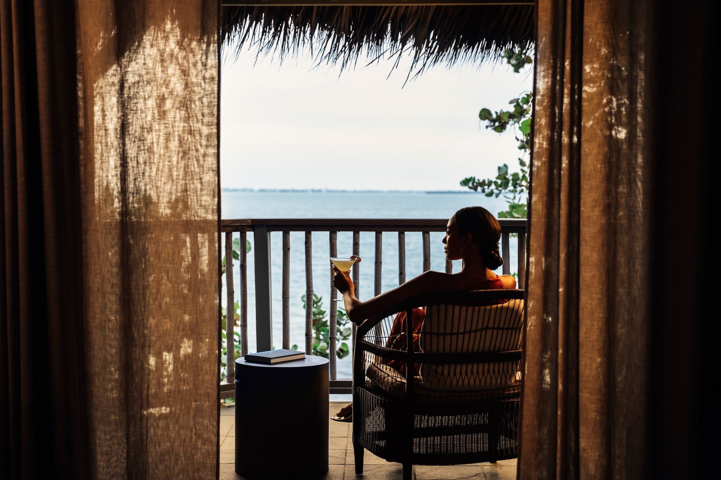 woman on patio in Island Grand Suite