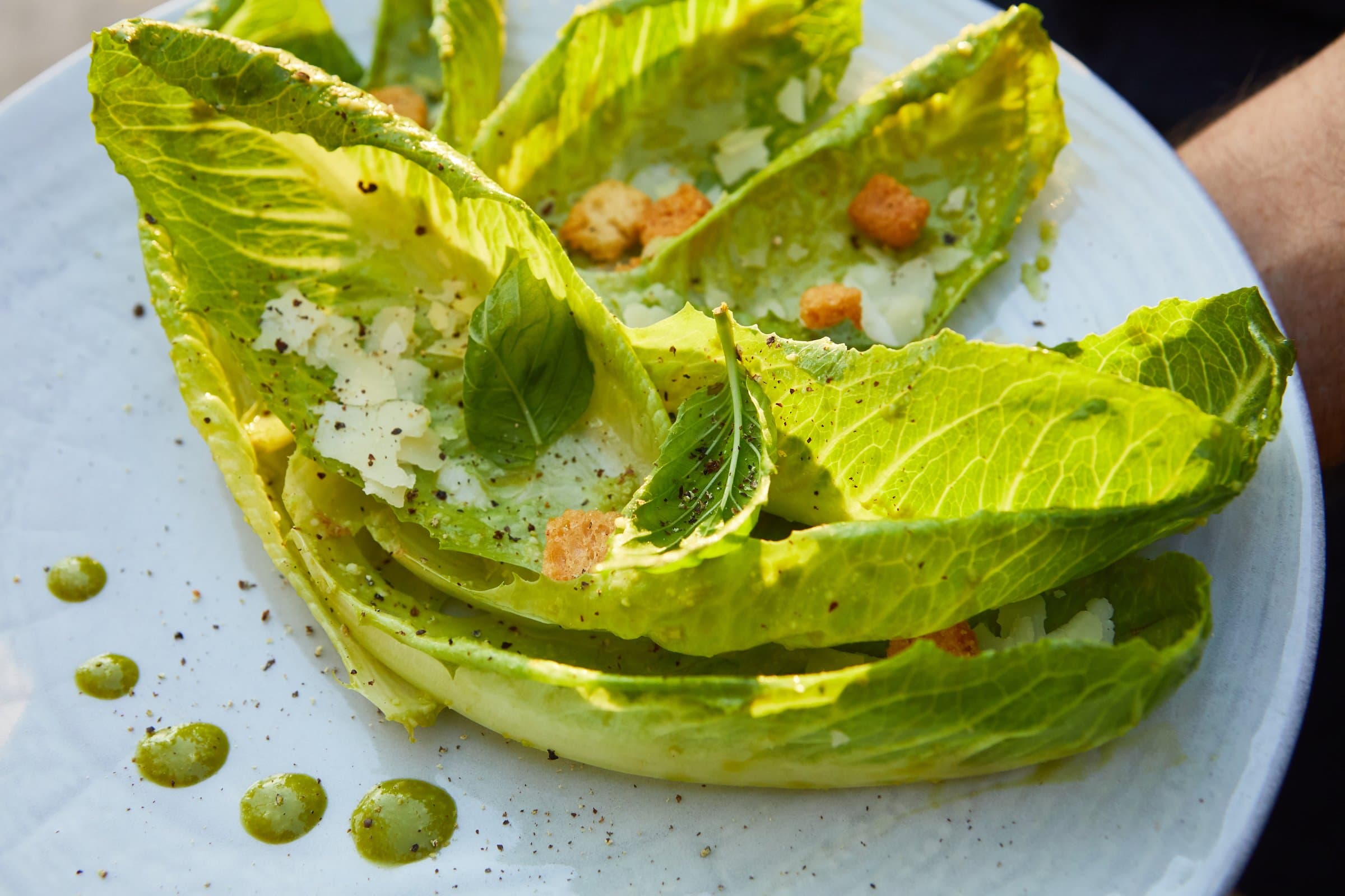 A salad on a plate served from the restaurant at Little Palm Island Resort