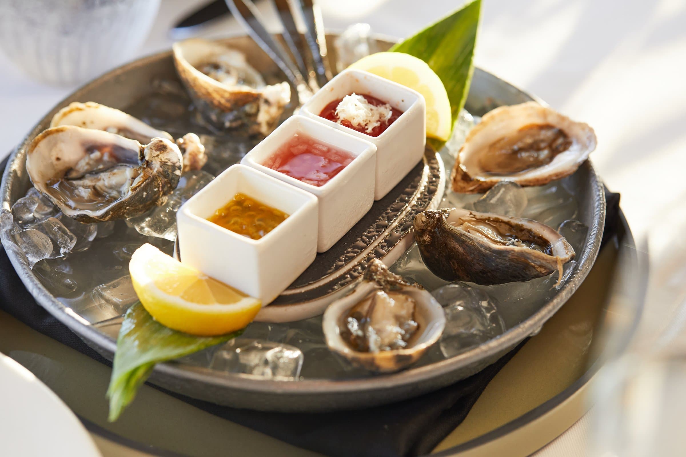 The Chef's Tasting Menu laid on a dinner table at Little Palm Island Resort