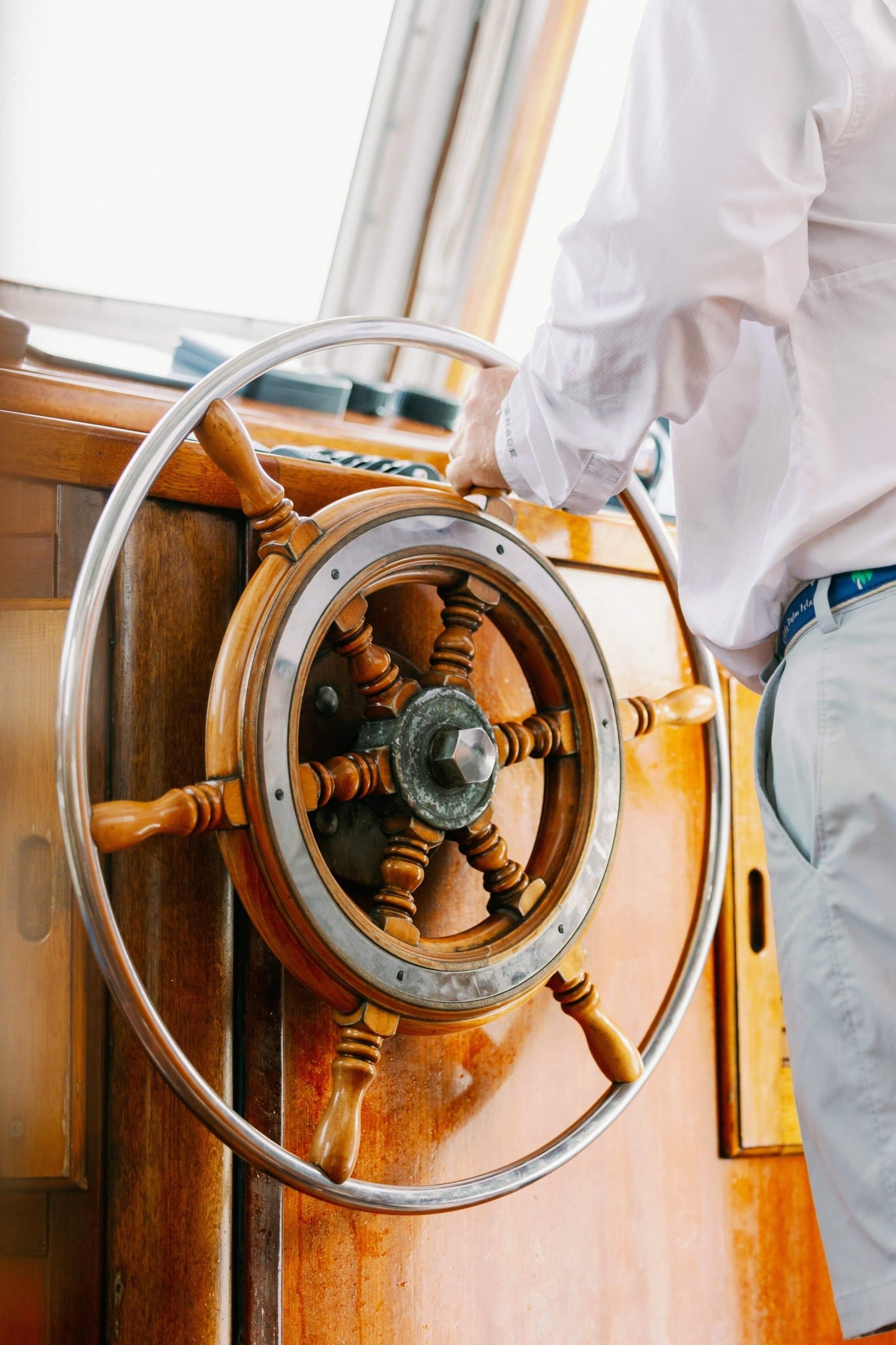 Captain steering the boat at Little Palm Island.