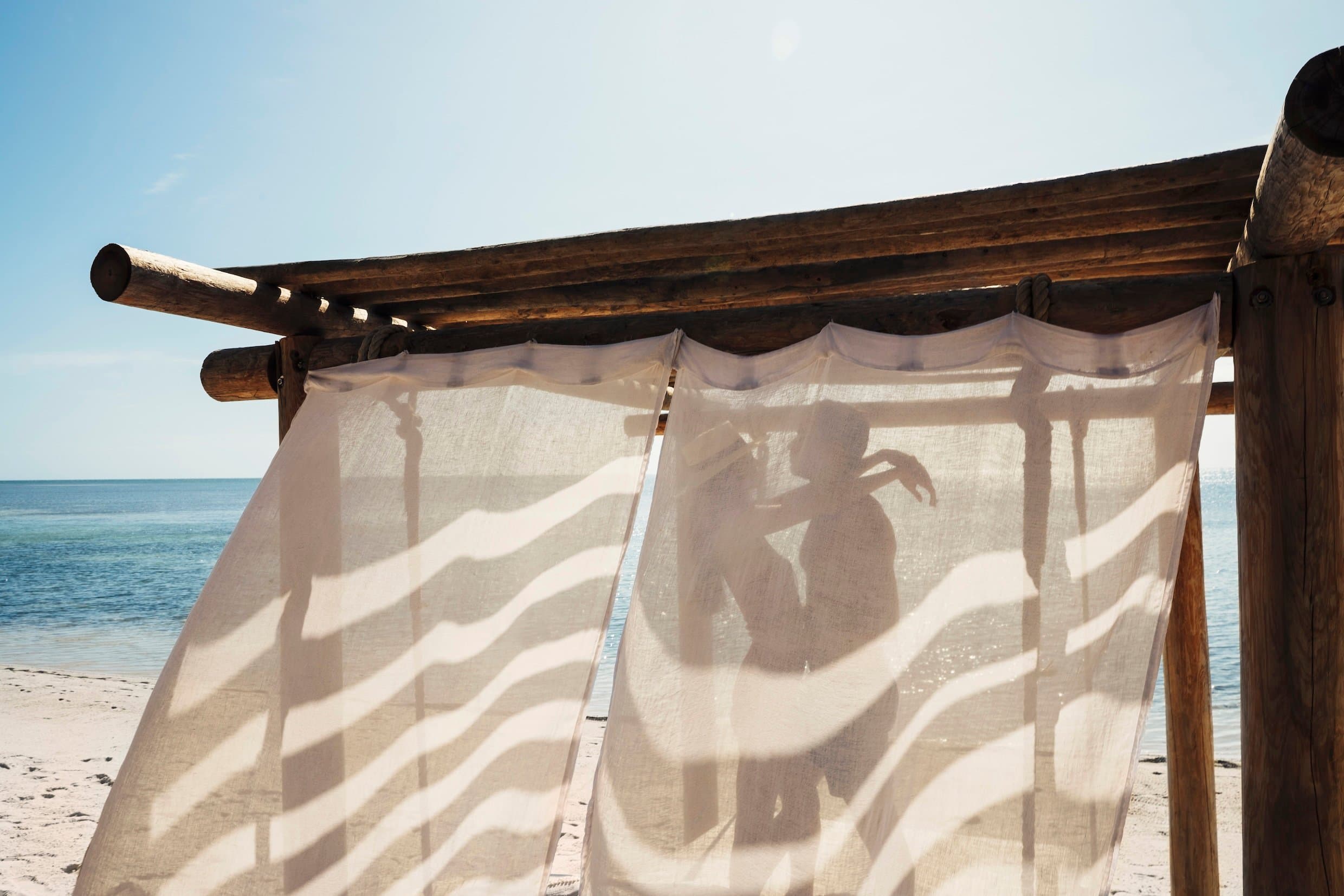 couple in beach gazebo