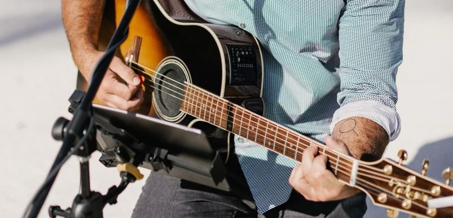 Close-up of Rusty Lemmon's guitar.