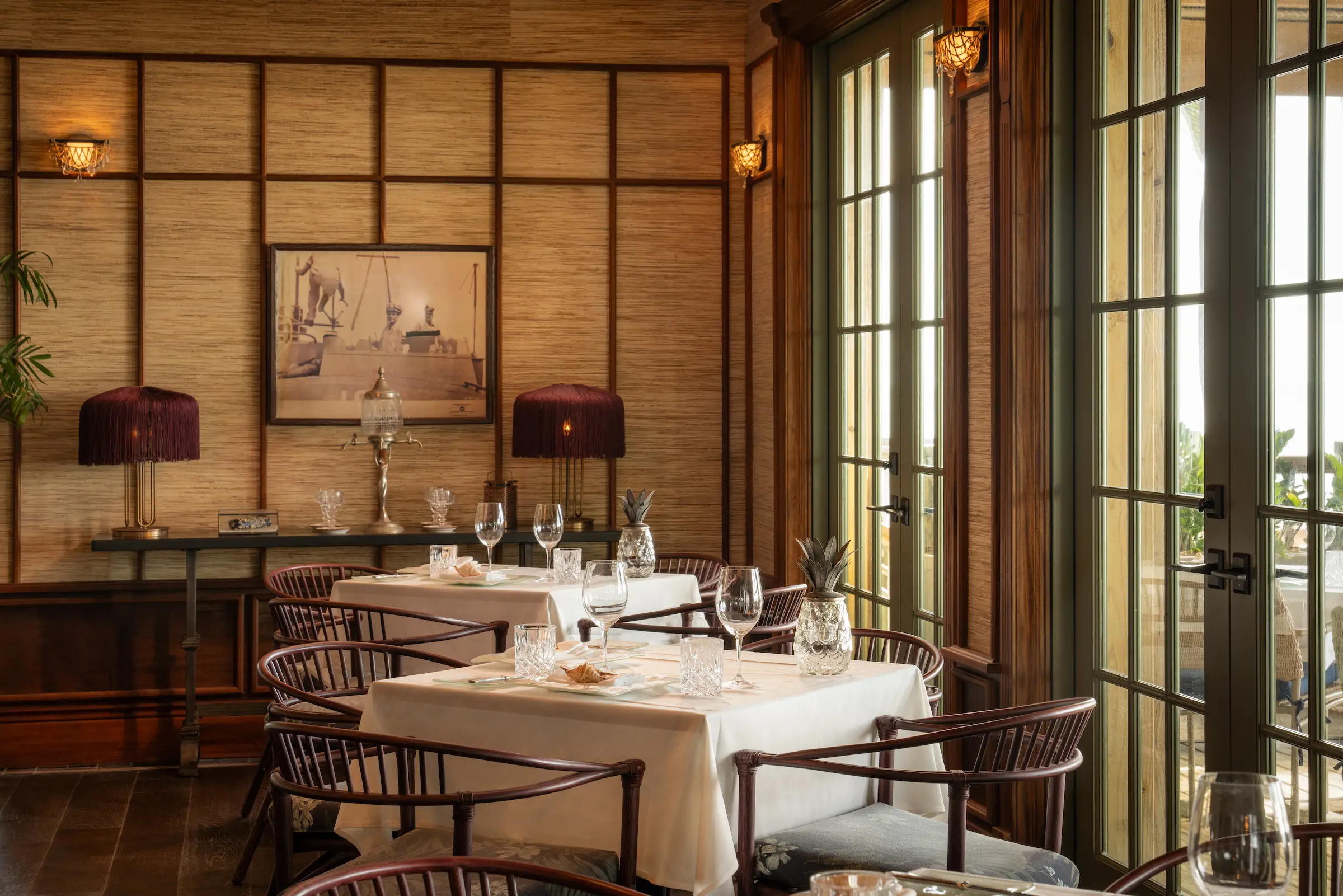 Glassware and cutlery set up at the dining room of Little Palm Island Resort