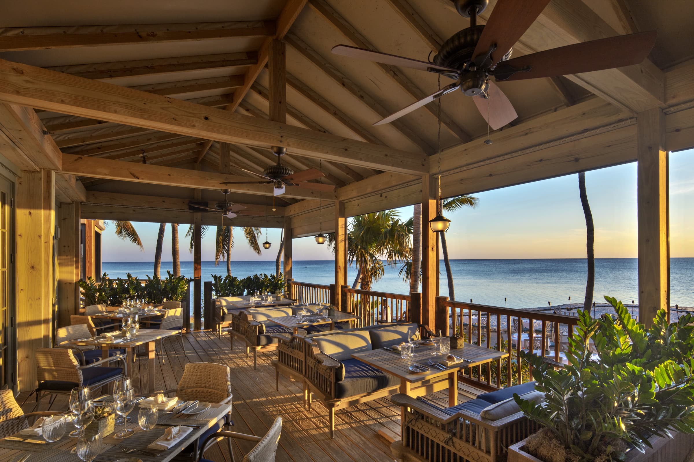 Outdoor seating outside the dining room at Little Palm Island Resort