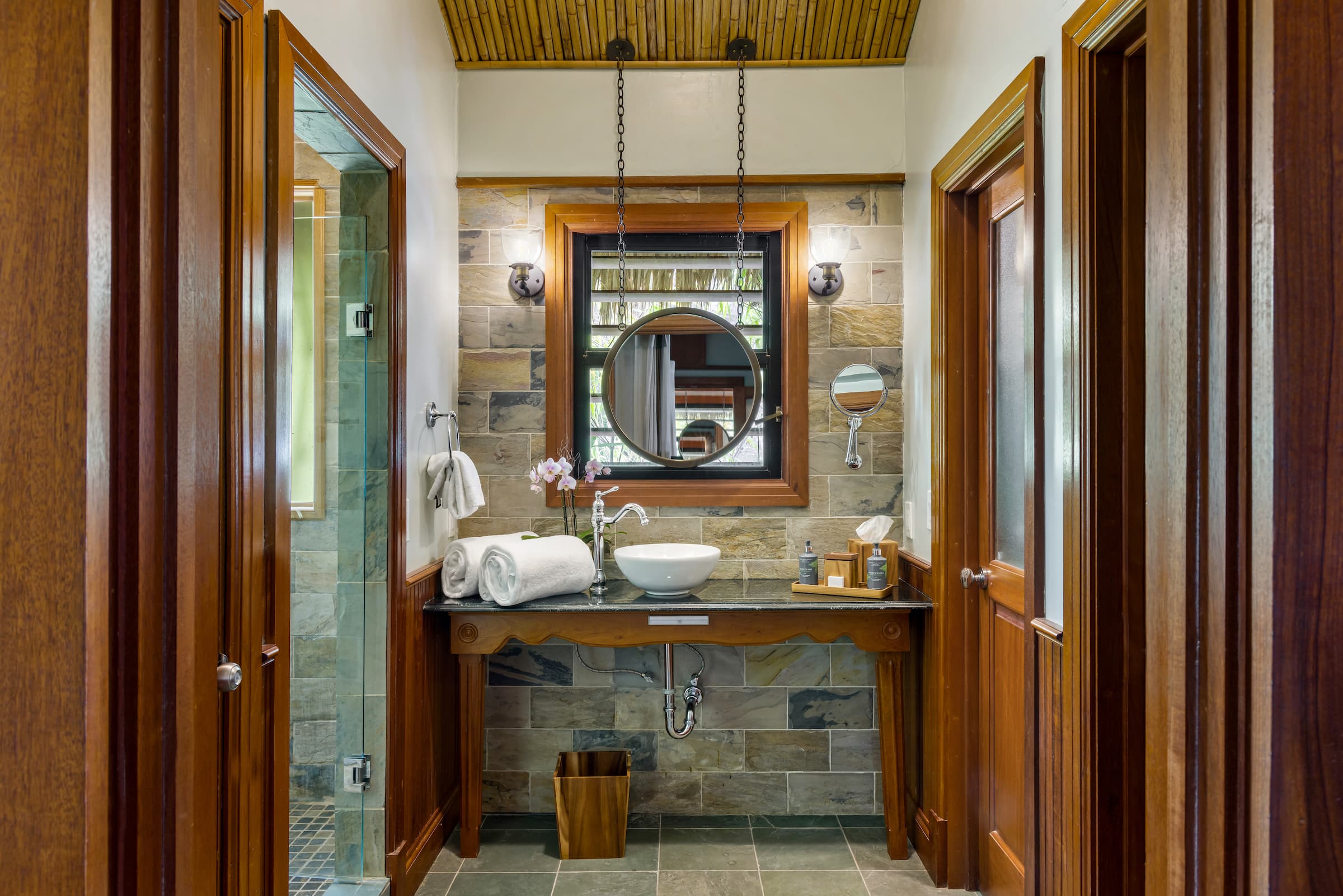 The bathroom interior in a Grand Suite at Little Palm Island Resort