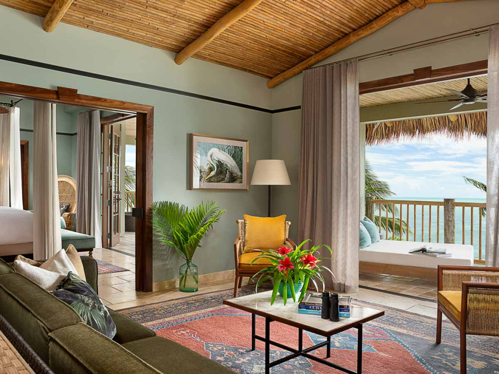 Suite living room with ocean view in Little Palm Island