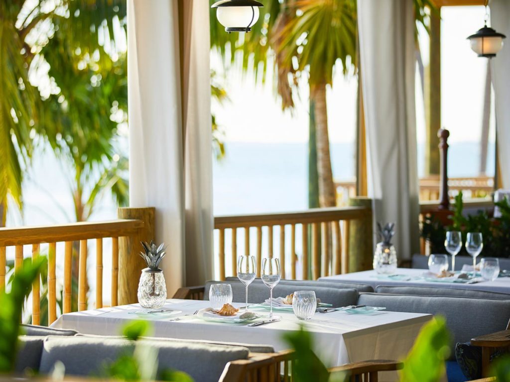 Outdoor dining by the ocean.