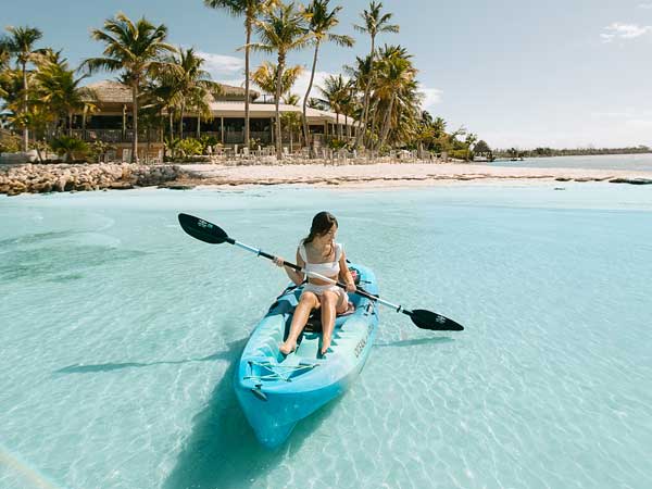 Lady In Kayak Near Little Palm Island.