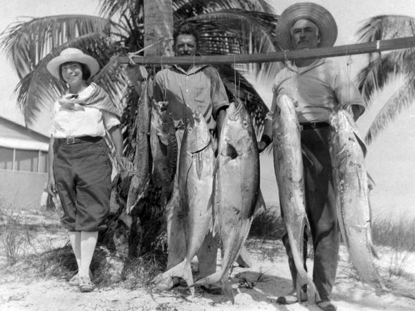 People With Fish They Caught.