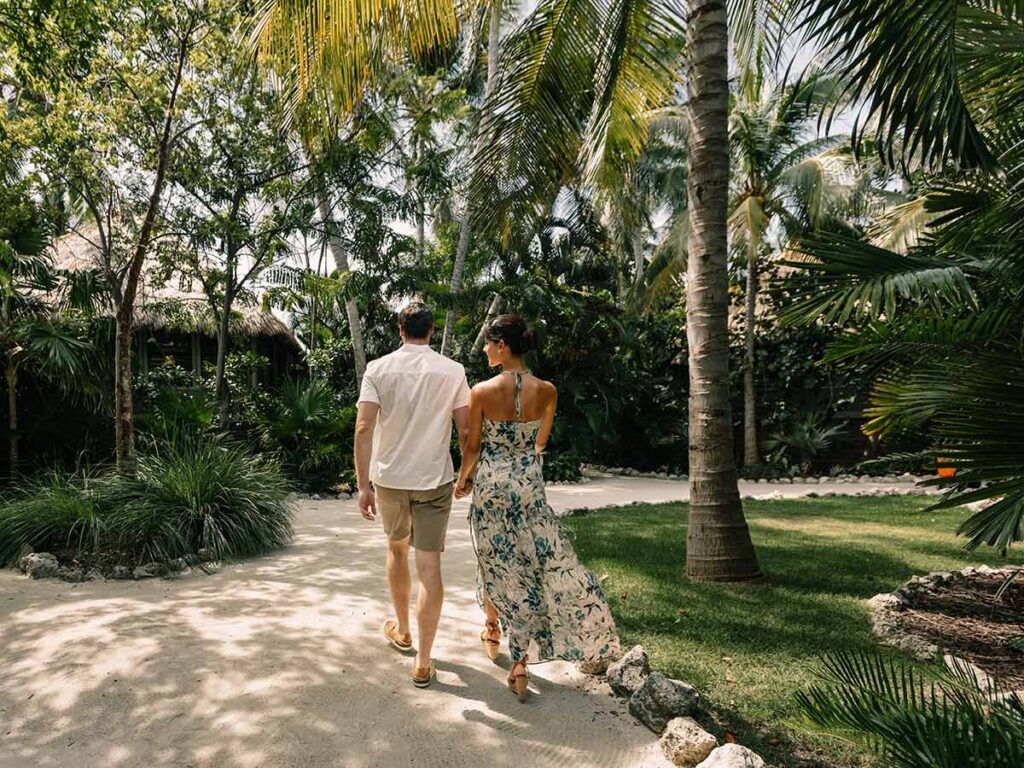 Couple Walking On A Pathway.